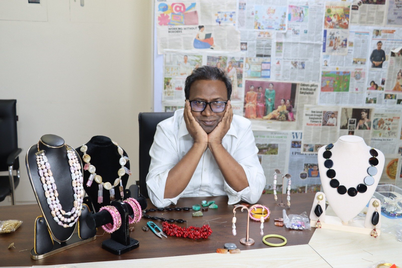 A table of handcrafted pearl, agate and stone jewellery
